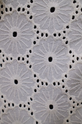 Daisy lace, embroidered and cut by machine, finished by hand