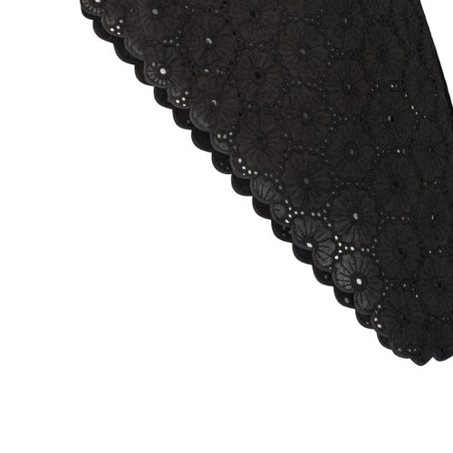 A scalloped embroidered edge